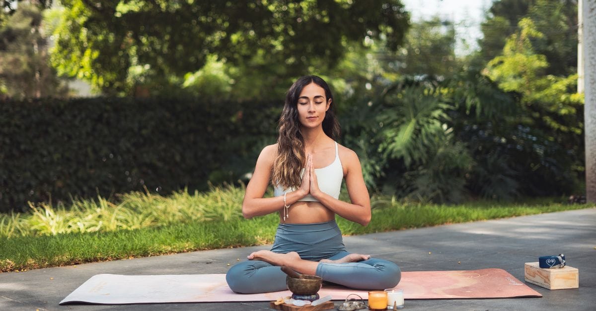 Woman Meditating Outdoors