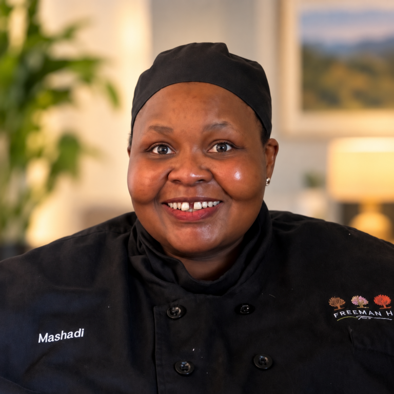 Mashadi Esther Teane | Head Chef at Freeman House Recovery, pictured in a black chef uniform